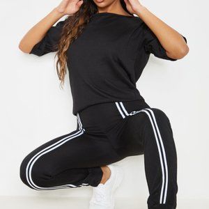 New PrettyLittleThing Black Loop Back Sports Stripe Jumpsuit
